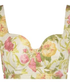 This Indo Western top is handcrafted from exquisite jacquard fabrics patterned with an intricate flowerbed design. Now at Monique Singh